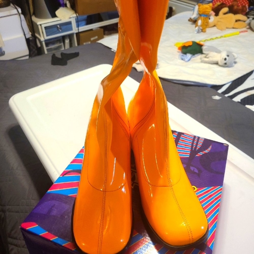 Knee high orange boots size 9